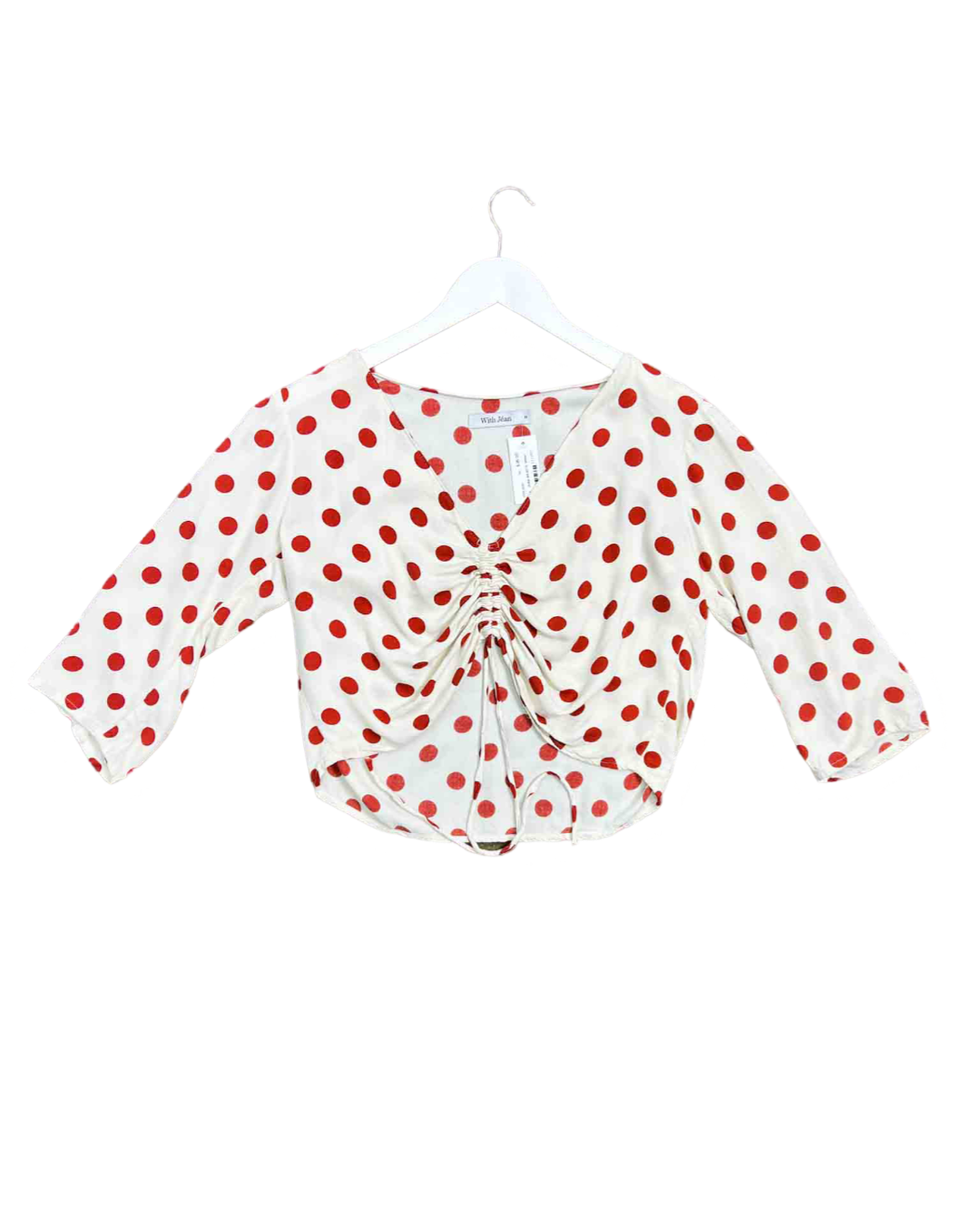 White top with red polka dots hotsell